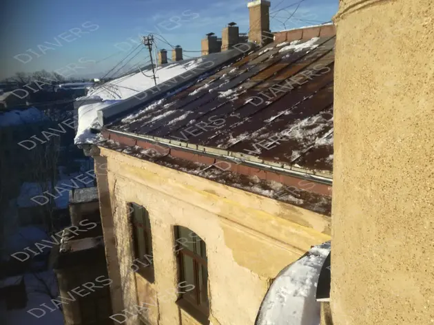 Dächer von Eis und Eiszapfen reinigen